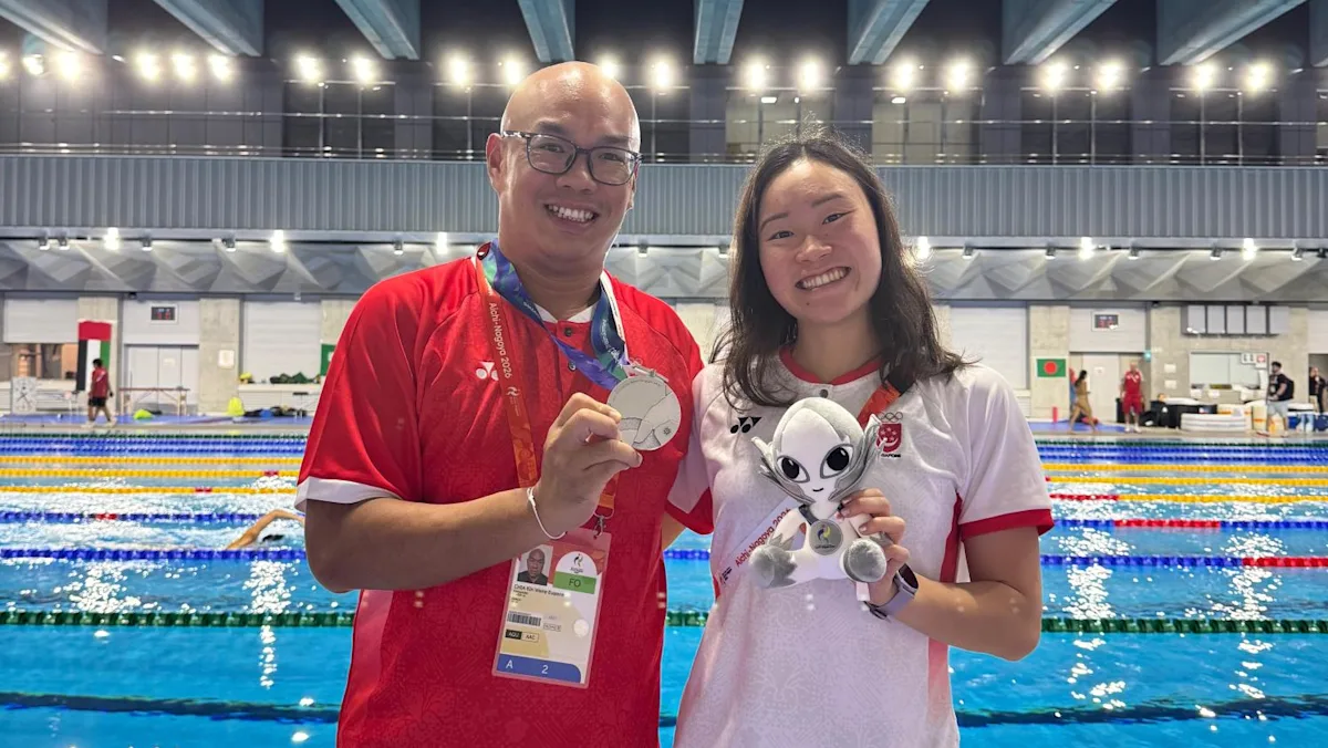 Gan Ching Hwee dan pelatih Eugene Chia di ajang Asian Games